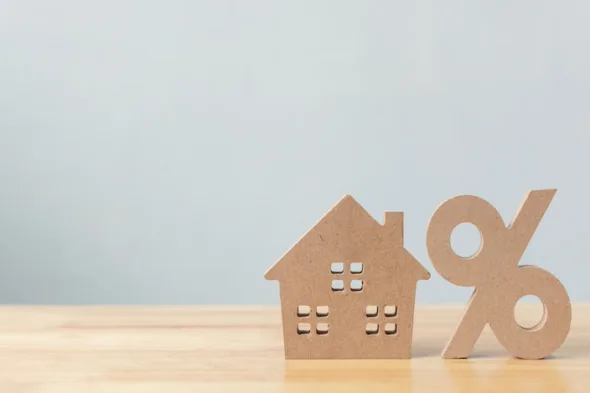 casa in miniatura con percentuale