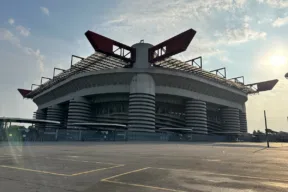 Which stadium is bigger, San Siro in Milan or the Stadio Olimpico in Rome?
